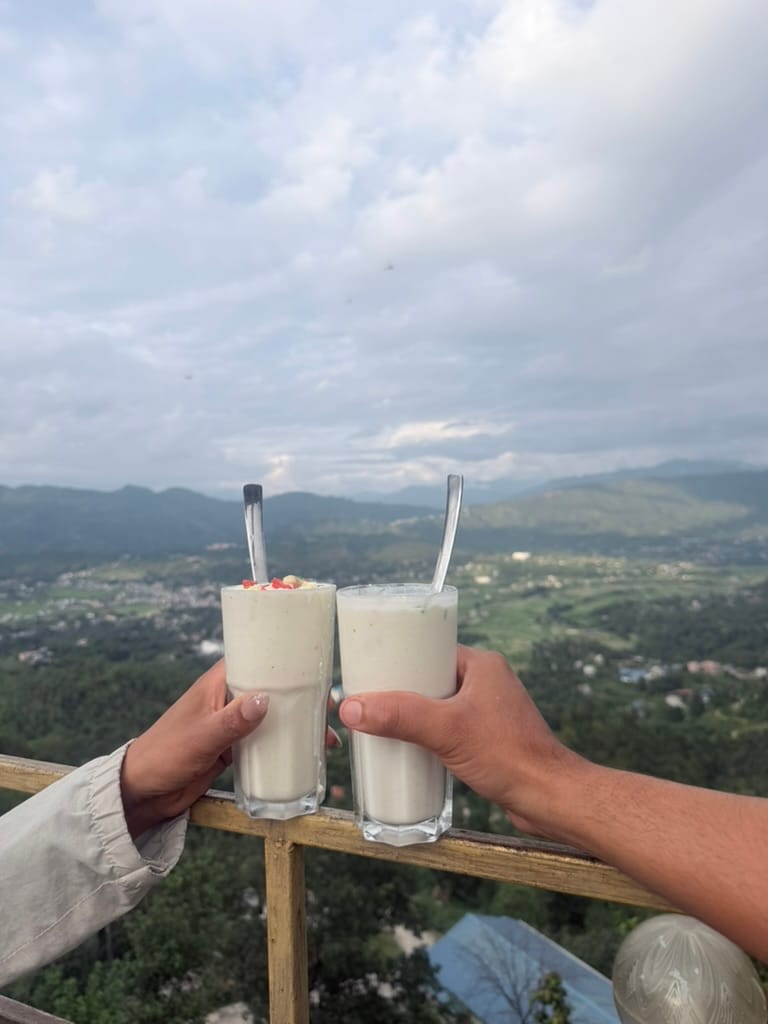 Two lassis, one railing, the whole valley.